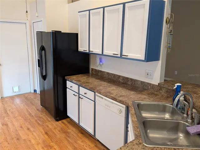 a bathroom with a shower and toilet