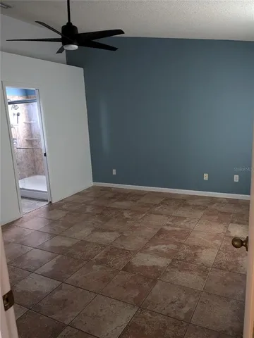 a bathroom with a double vanity sink and shower
