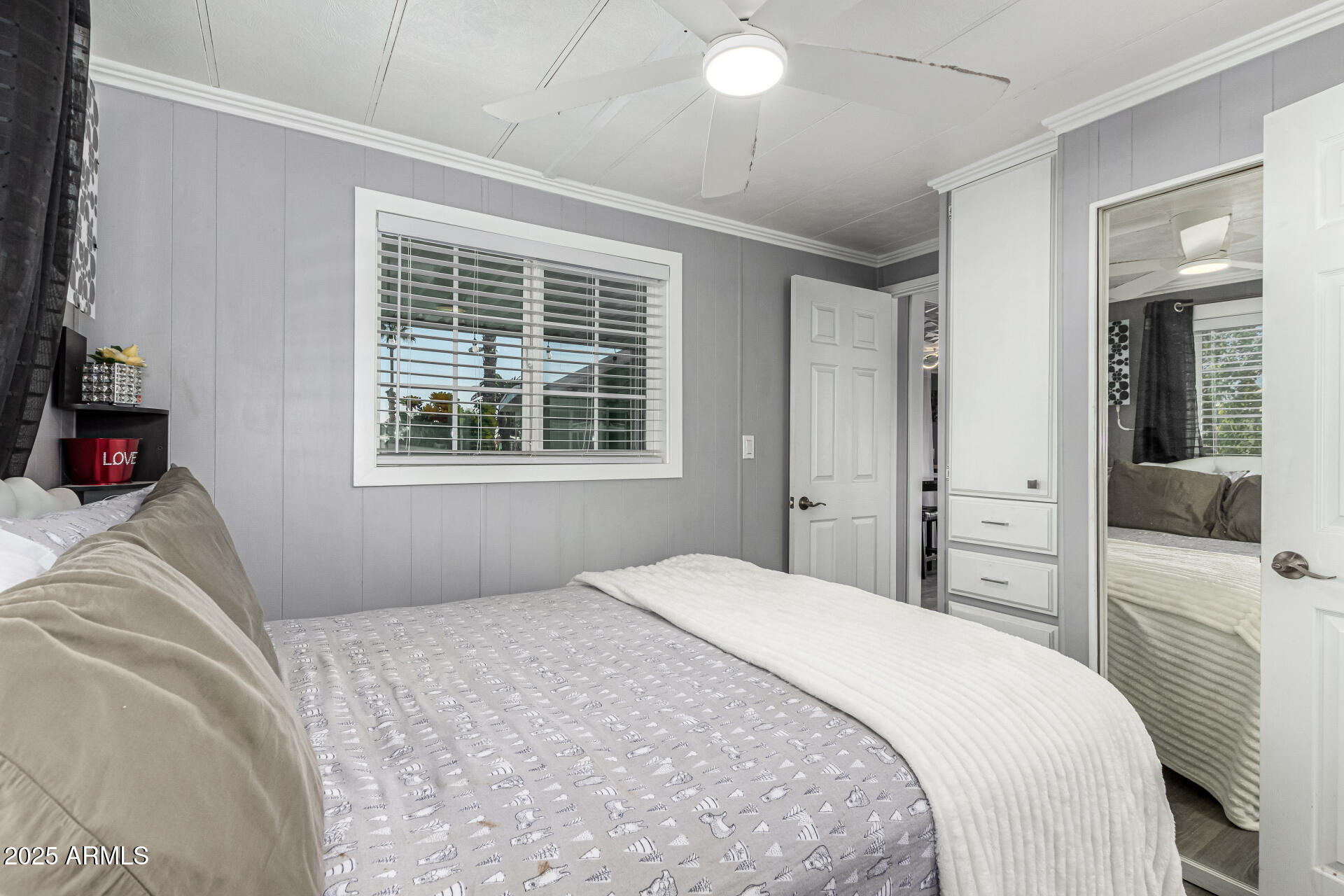 15606 South Gilbert Road, Unit 109 Chandler, AZ 85225 - Photo 17 of 49 a bedroom with a bed and a window
