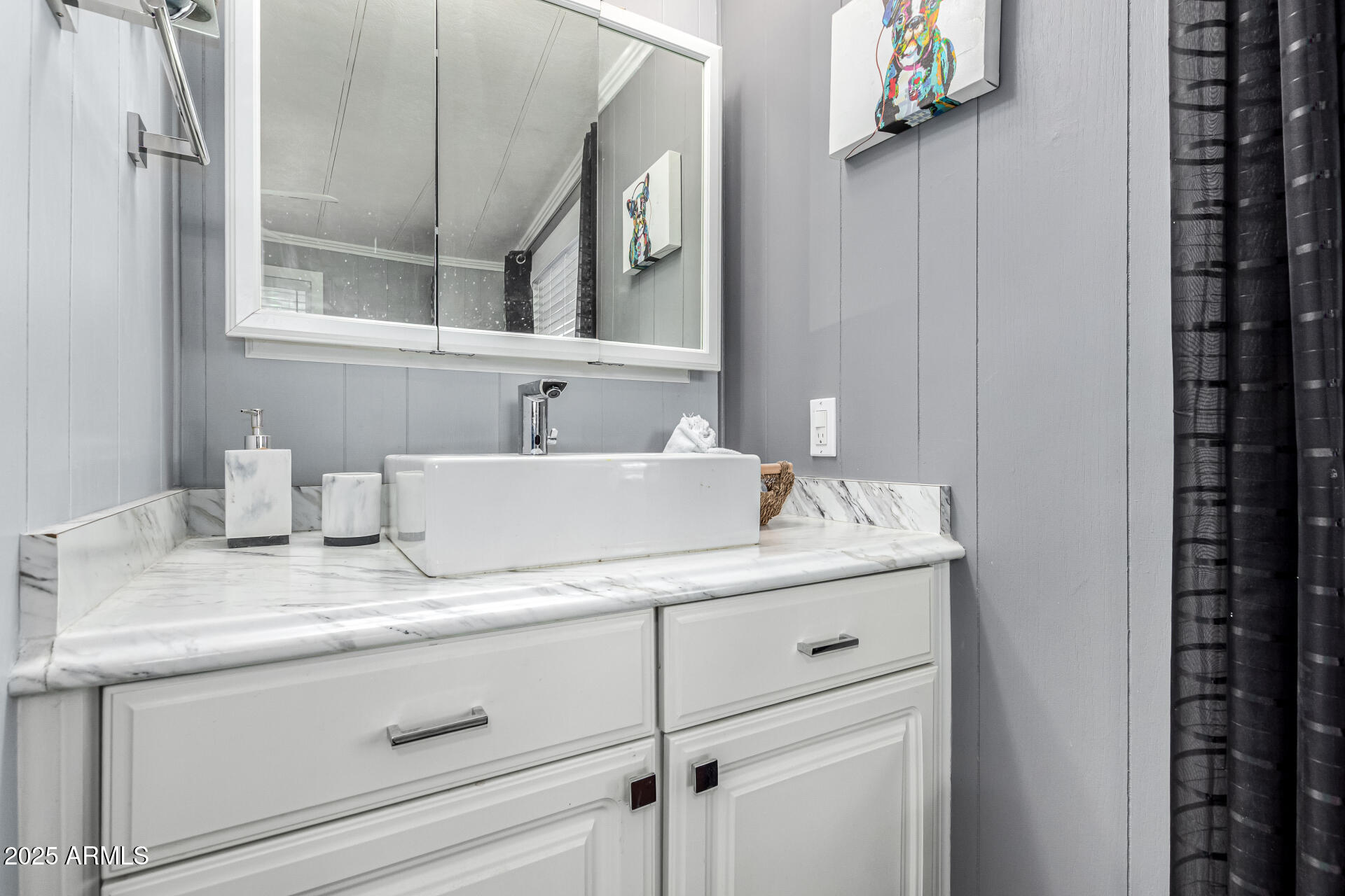 15606 South Gilbert Road, Unit 109 Chandler, AZ 85225 - Photo 18 of 49 a bathroom with a sink and a mirror
