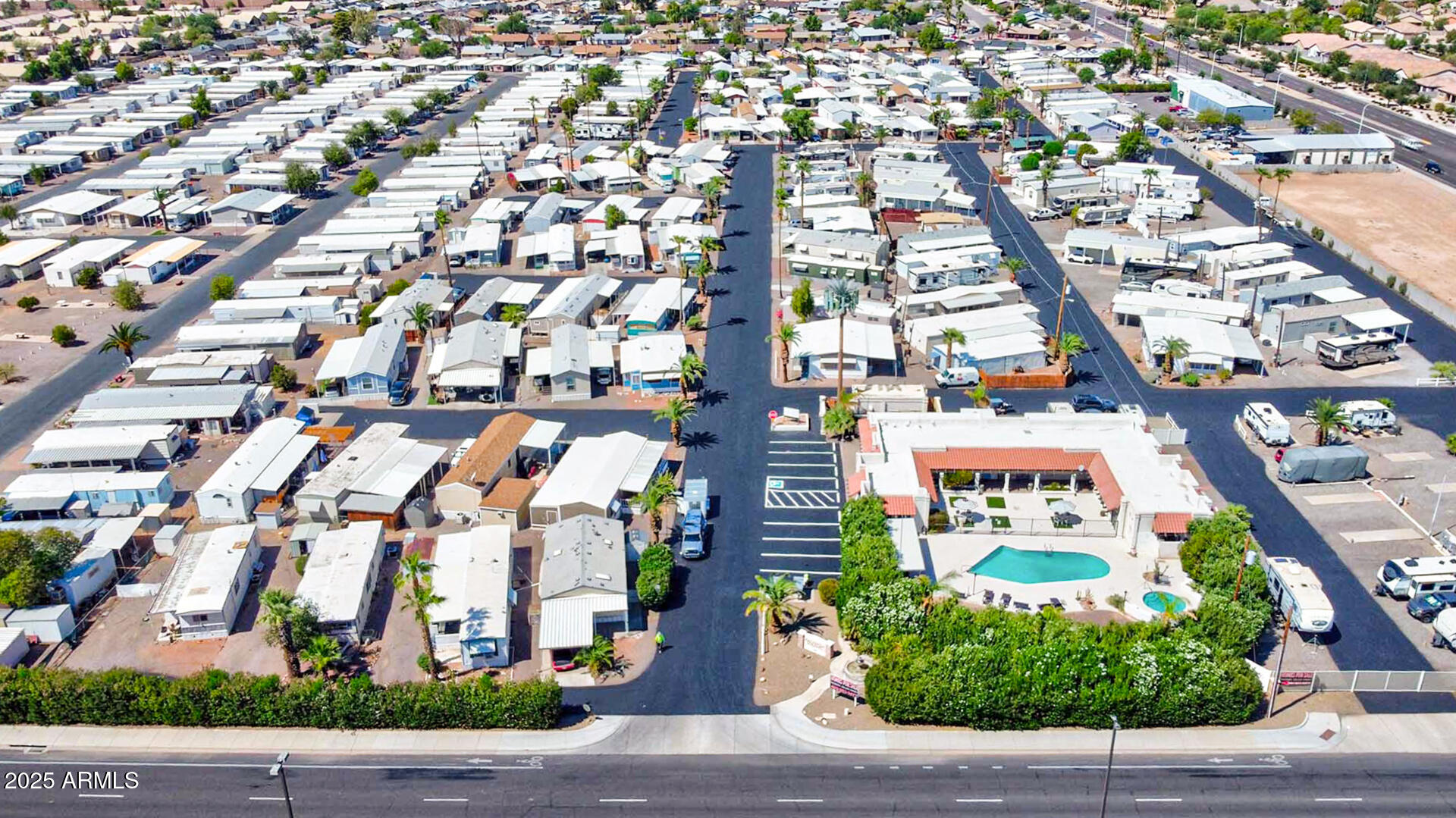 15606 South Gilbert Road, Unit 109 Chandler, AZ 85225 - Photo 28 of 49 an aerial view of residential building