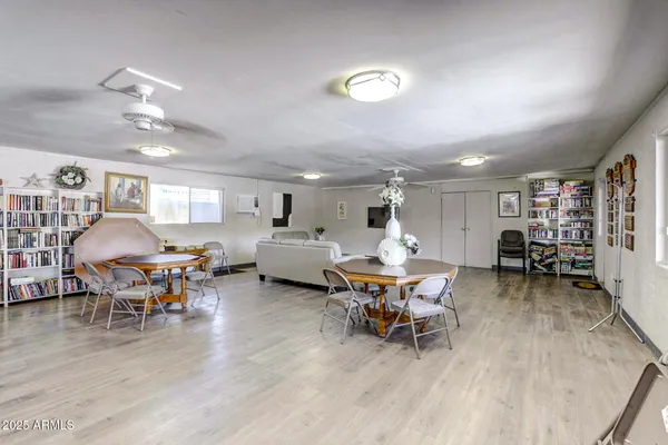 a room with furniture and pool table