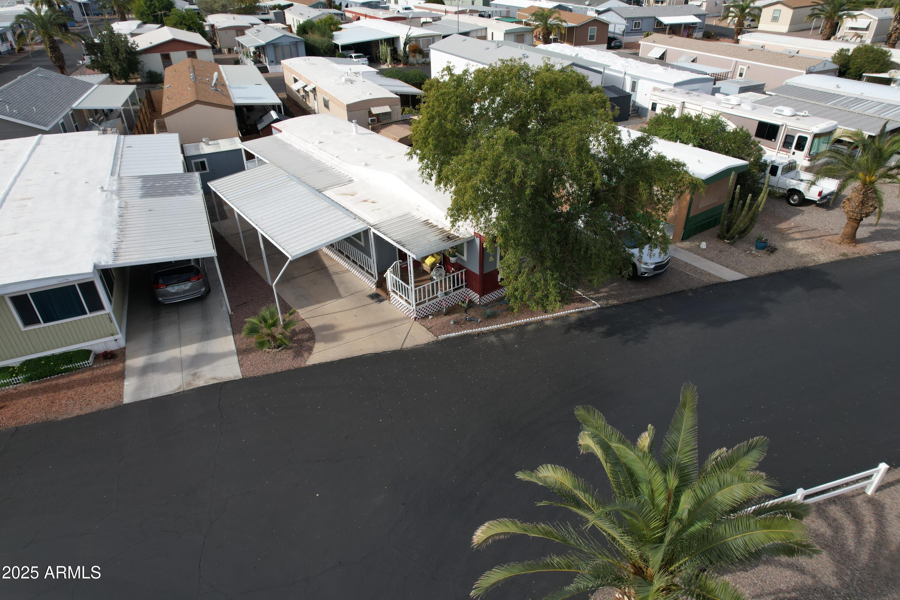 15606 South Gilbert Road, Unit 109 Chandler, AZ 85225 - Photo 46 of 49 an aerial view of a house with garden space and sitting area