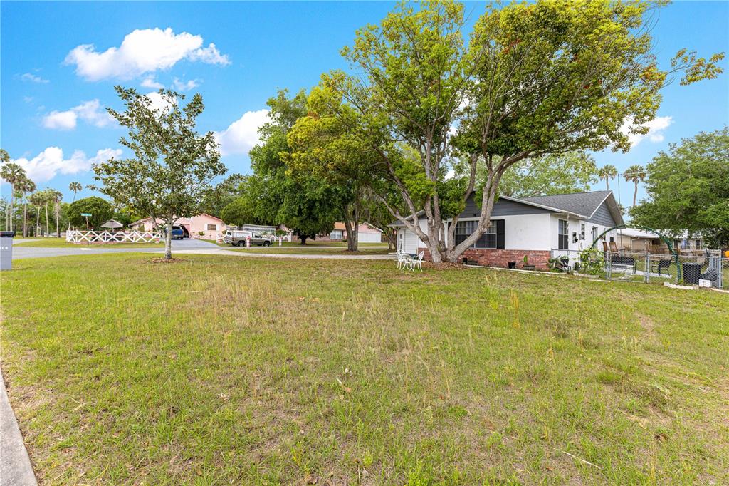 508 Emerald Road Ocala, FL 34472 - Photo 6 of 32 a view of a house with pool and chairs