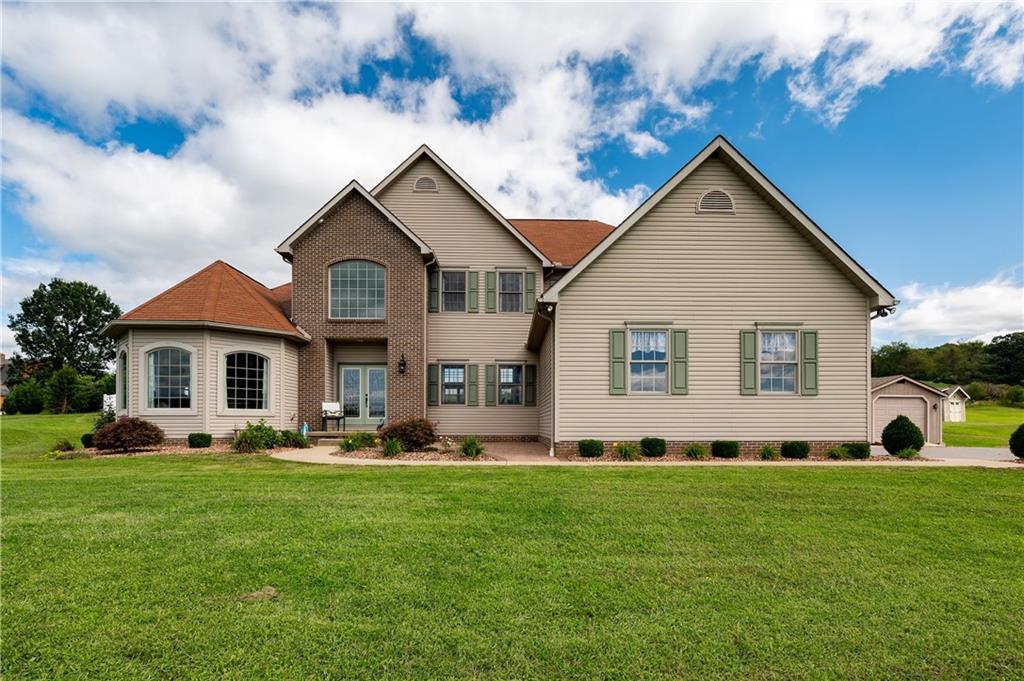 1147 Sarver Road Sarver, PA 16055 - Photo 1 of 19 a front view of house with yard and green space