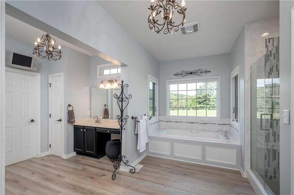 1147 Sarver Road Sarver, PA 16055 - Photo 13 of 19 a spacious bathroom with a tub sink and a mirror