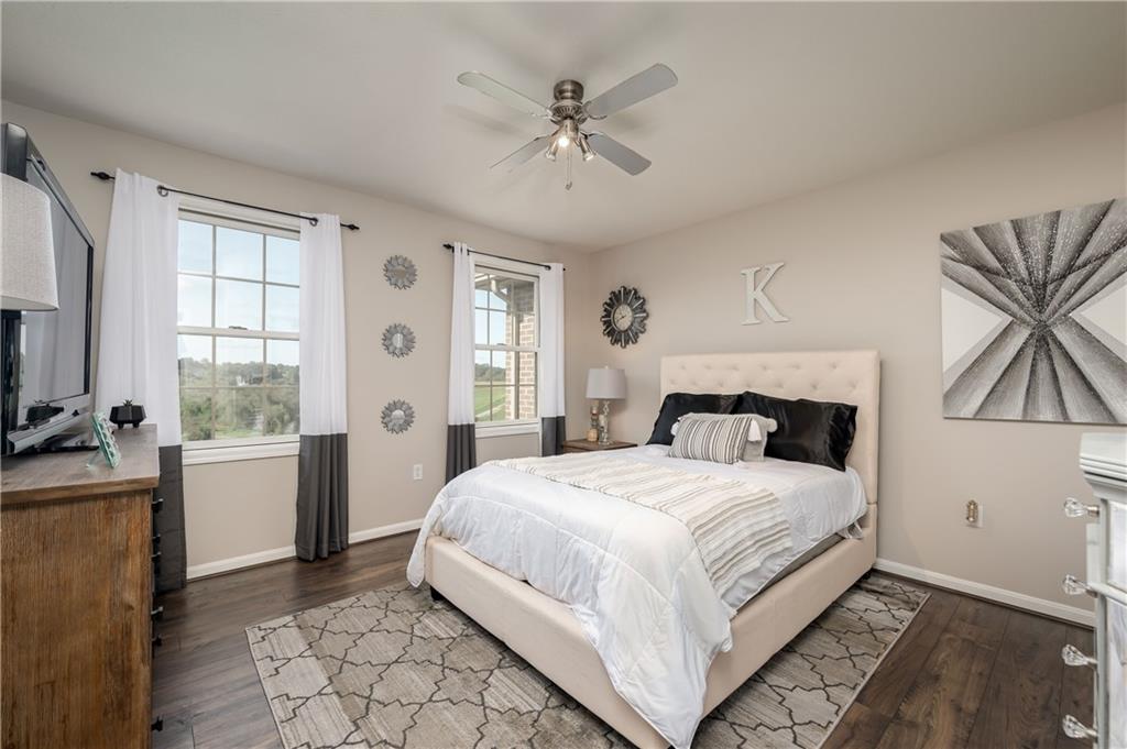 1147 Sarver Road Sarver, PA 16055 - Photo 16 of 19 a bedroom with a large bed and a chandelier