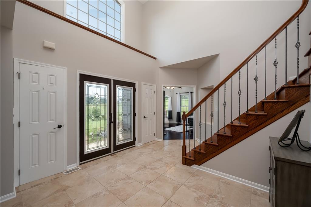 1147 Sarver Road Sarver, PA 16055 - Photo 2 of 19 a view of an entryway with wooden floor and front door