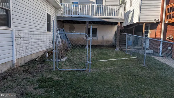 a view of back yard of the house
