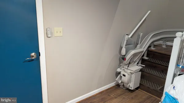 a view of entryway with wooden floor