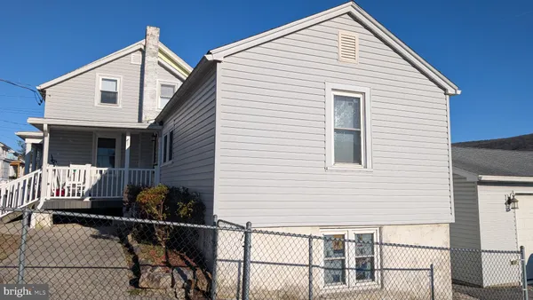 a view of a house with patio