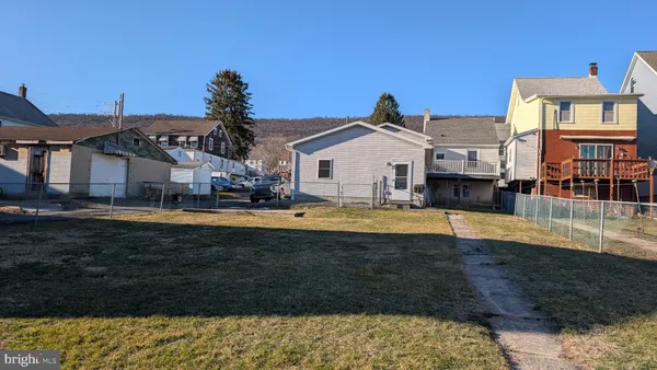 a view of a house with swimming pool