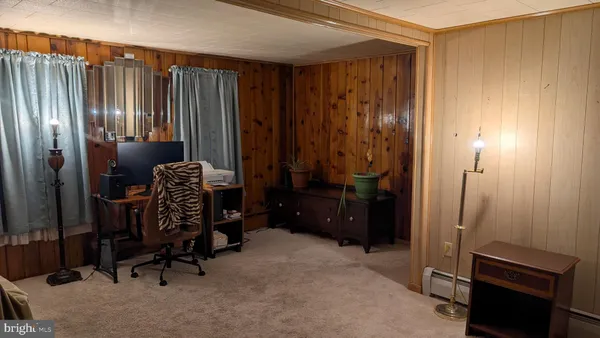 a room with chairs and a closet