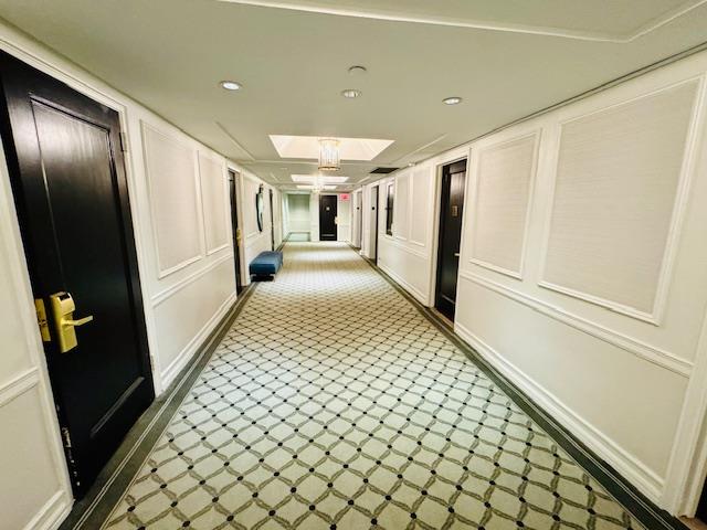 111 East 56th Street, Unit 712 Manhattan, NY 10022 - Photo 8 of 16 a view of gallery with wooden floor