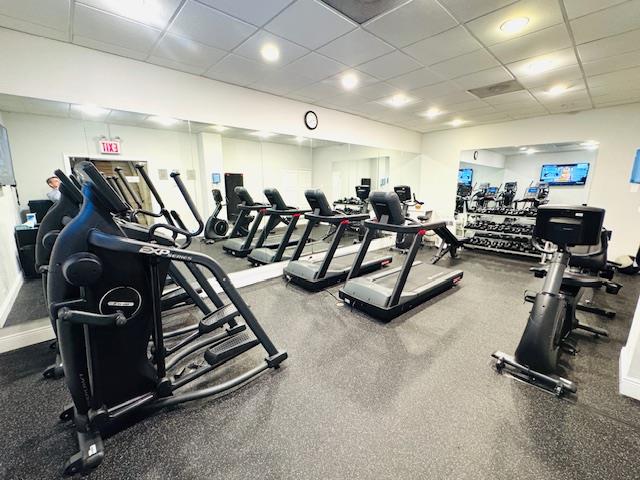 111 East 56th Street, Unit 712 Manhattan, NY 10022 - Photo 9 of 16 a view of a room with gym equipment