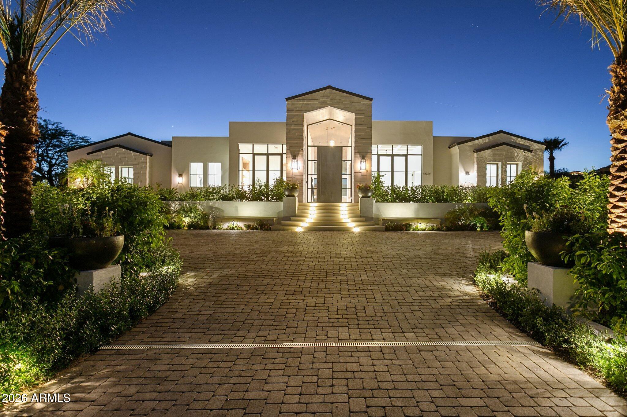 a view of a building with a yard