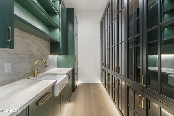 a spacious bathroom with a bathtub and mirror