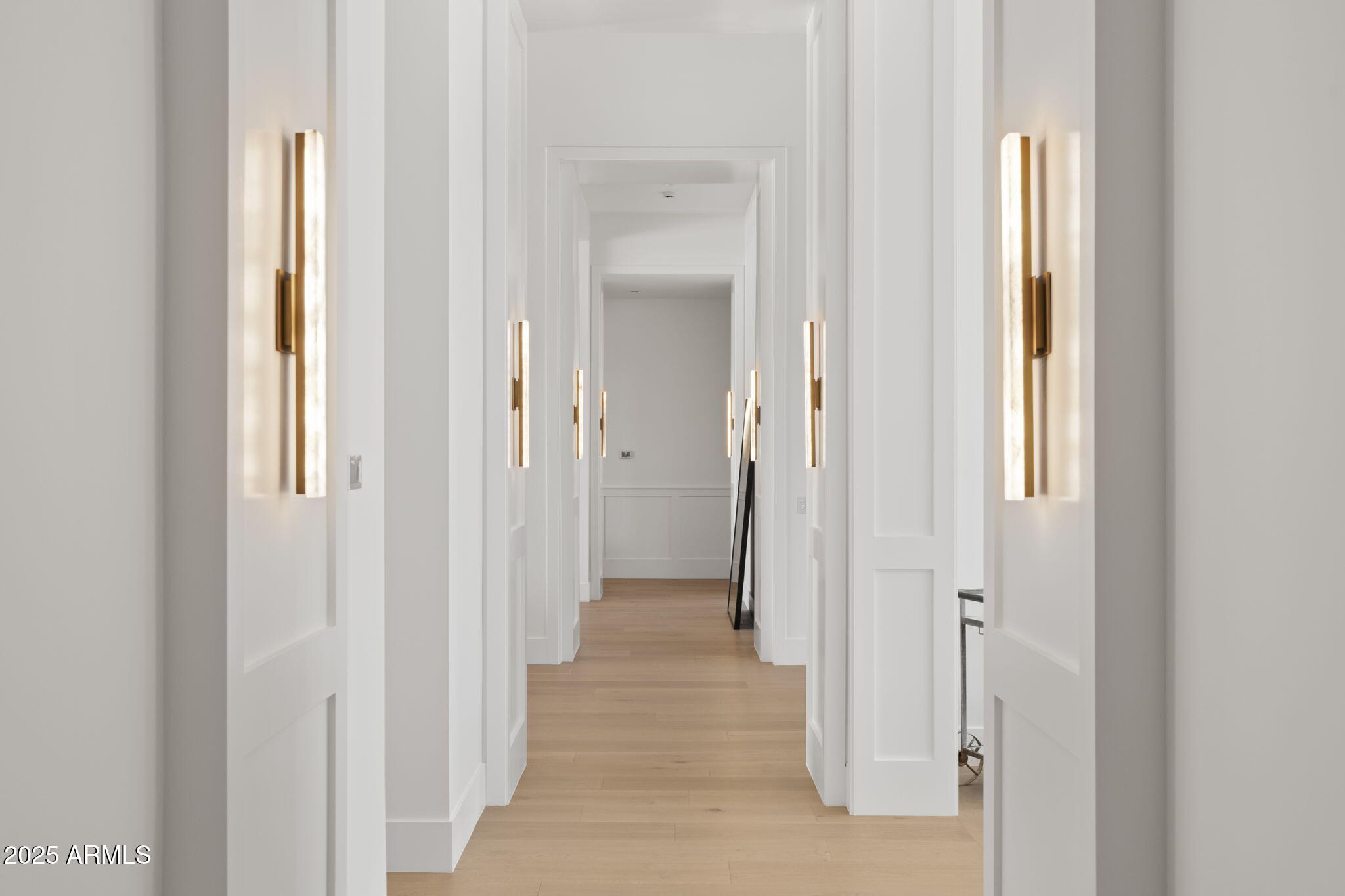 4534 East Pebble Ridge Road Paradise Valley, AZ 85253 - Photo 22 of 60 a view of a hallway with a wooden door