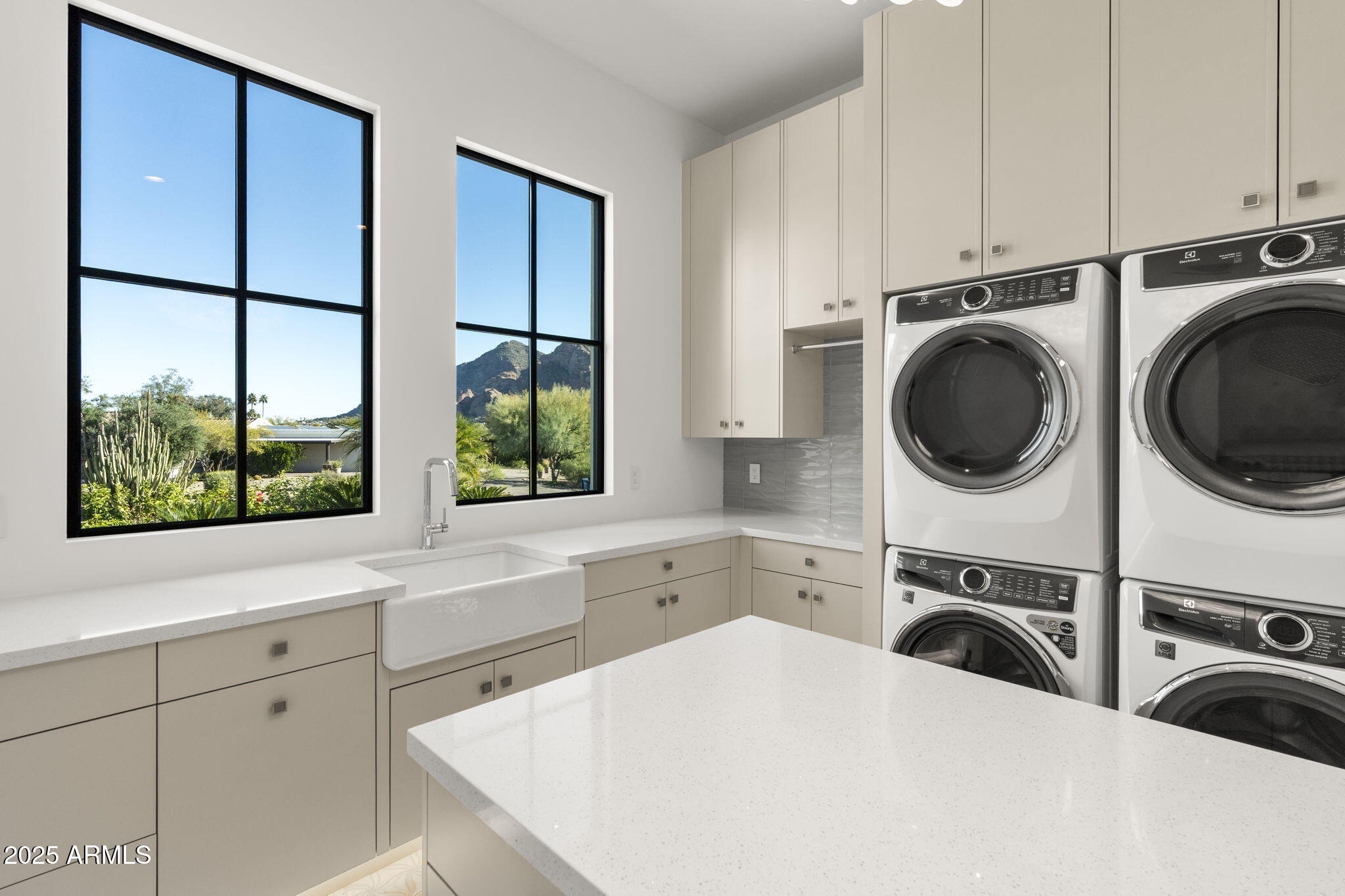 4534 East Pebble Ridge Road Paradise Valley, AZ 85253 - Photo 32 of 60 a view of a kitchen with sink washer and dryer