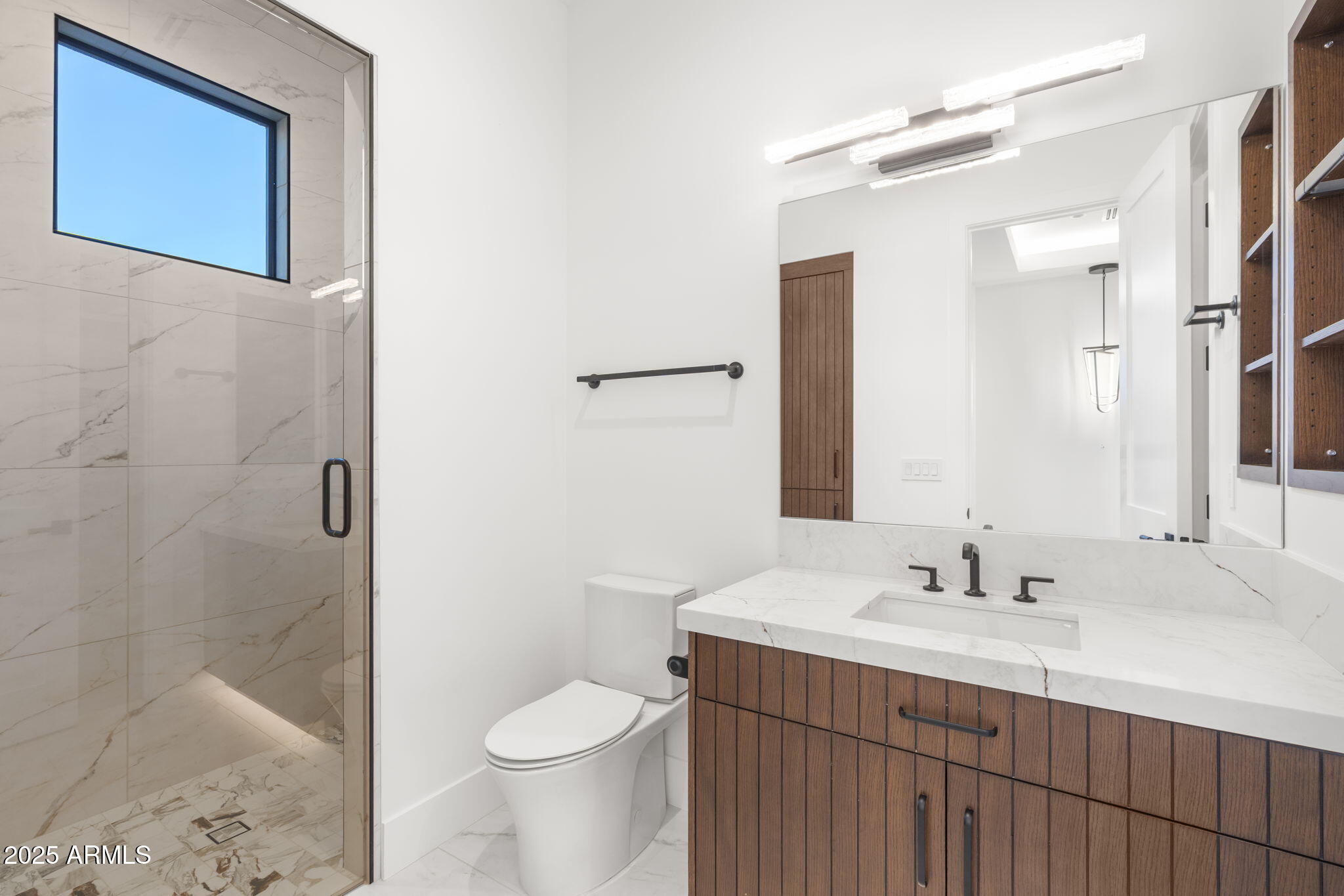 4534 East Pebble Ridge Road Paradise Valley, AZ 85253 - Photo 50 of 60 a bathroom with a sink a toilet and shower
