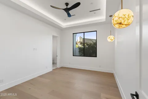 a bathroom with a double vanity sink toilet and shower