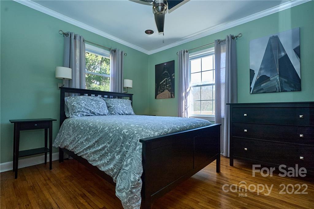 3112 Wolf Pond Road Monroe, NC 28112 - Photo 15 of 29 a bedroom with a bed and a window