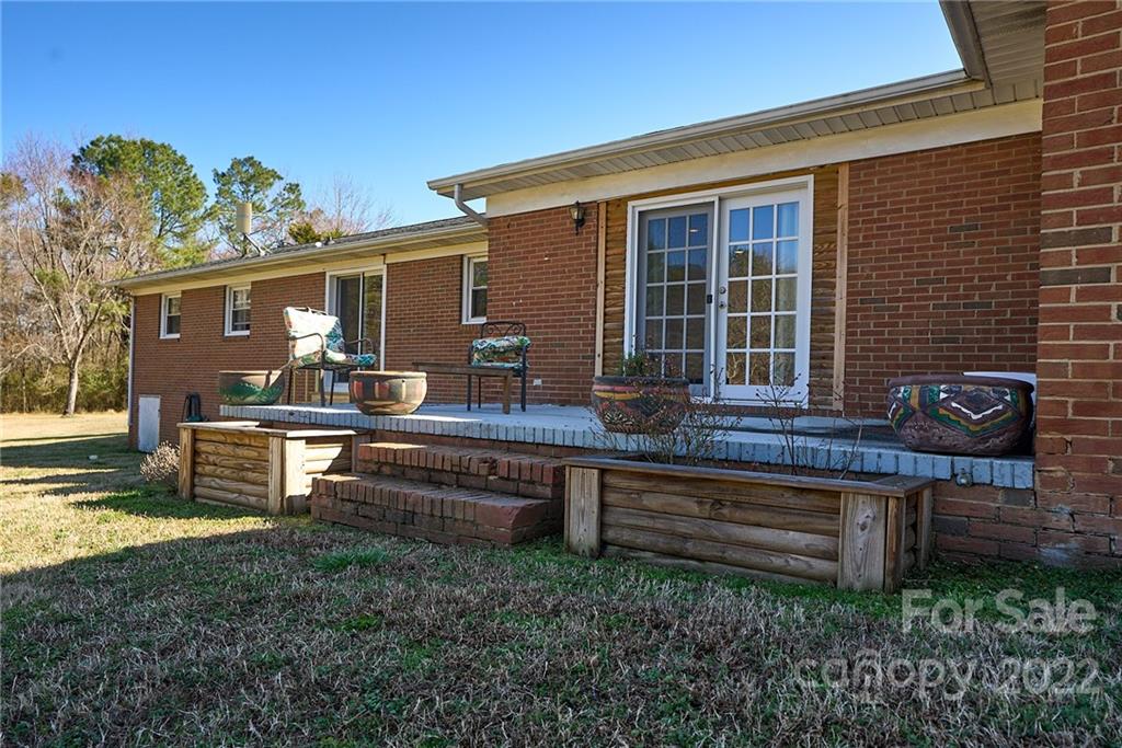 3112 Wolf Pond Road Monroe, NC 28112 - Photo 22 of 29 a house view with a outdoor seating space