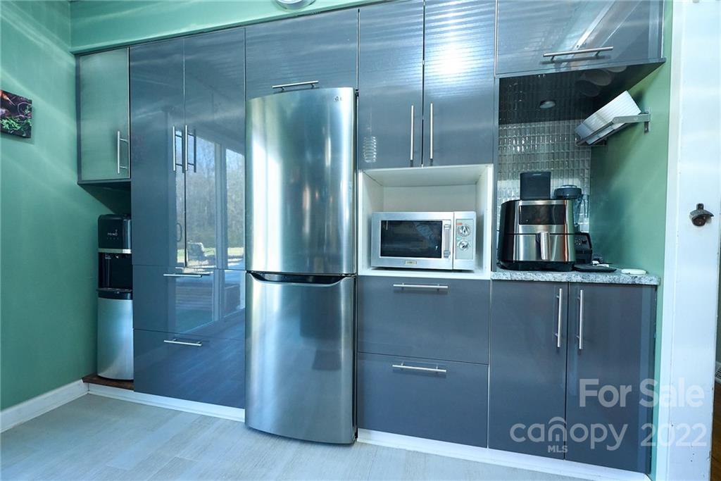 3112 Wolf Pond Road Monroe, NC 28112 - Photo 6 of 29 a view of a refrigerator in kitchen