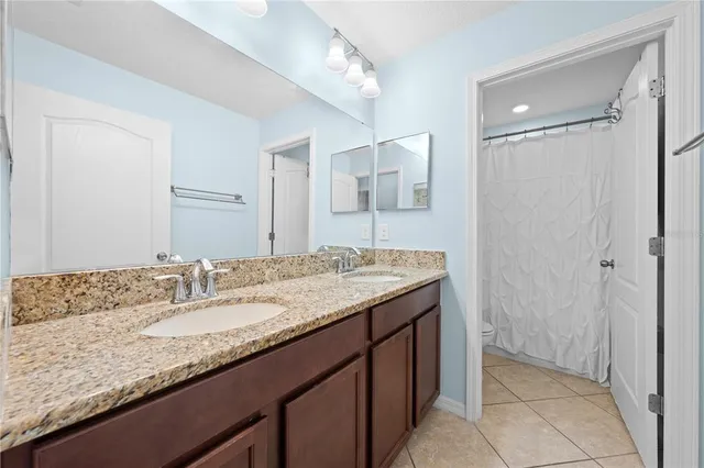 a view of a lake with a yard