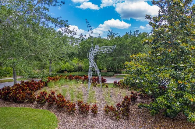 a view of a wooden deck with a yard