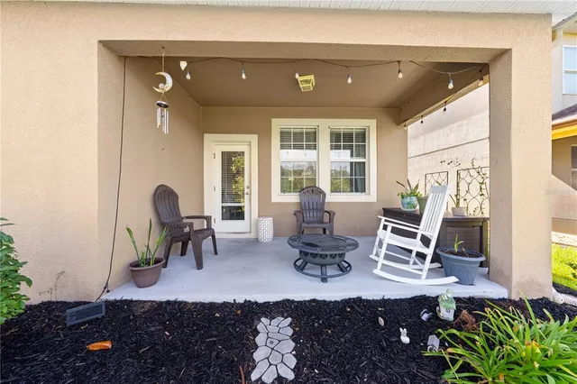 a view of a house with garden and yard