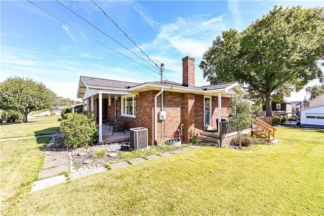 a front view of a house with patio