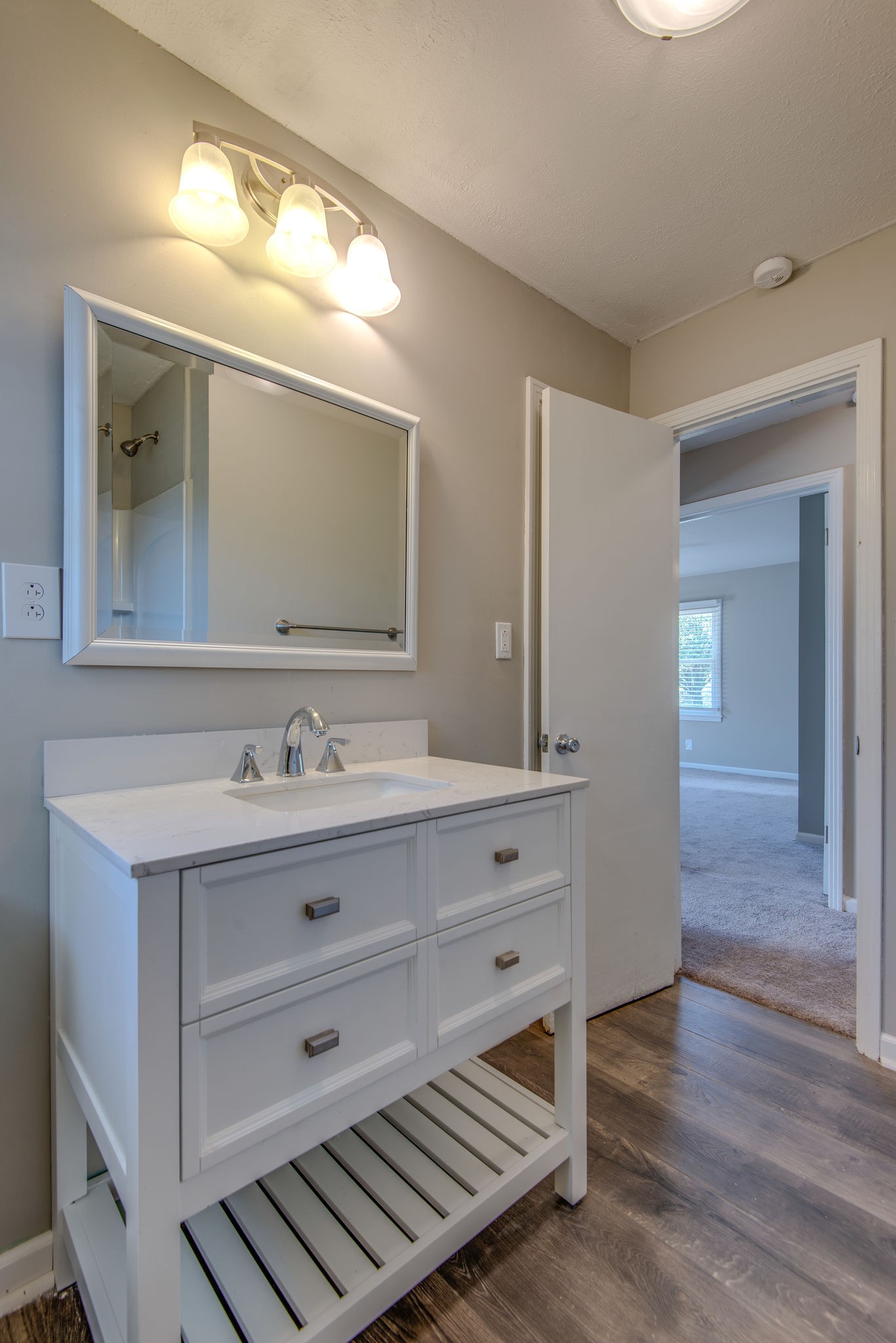 2154 Lake Road Greenbrier, TN 37073 - Photo 11 of 24 a bathroom with a sink mirror and vanity