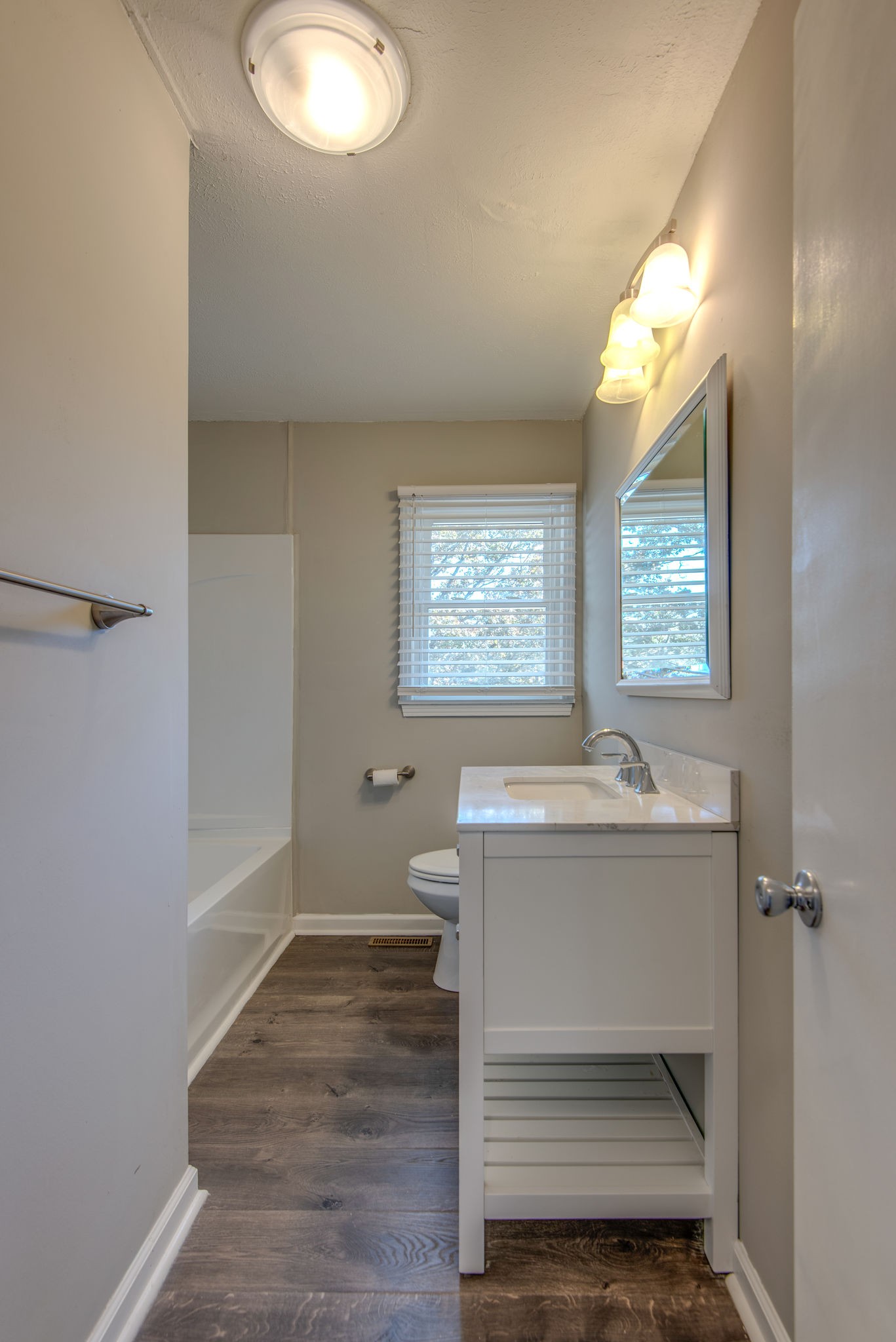 2154 Lake Road Greenbrier, TN 37073 - Photo 12 of 24 a bathroom with a sink toilet and a mirror