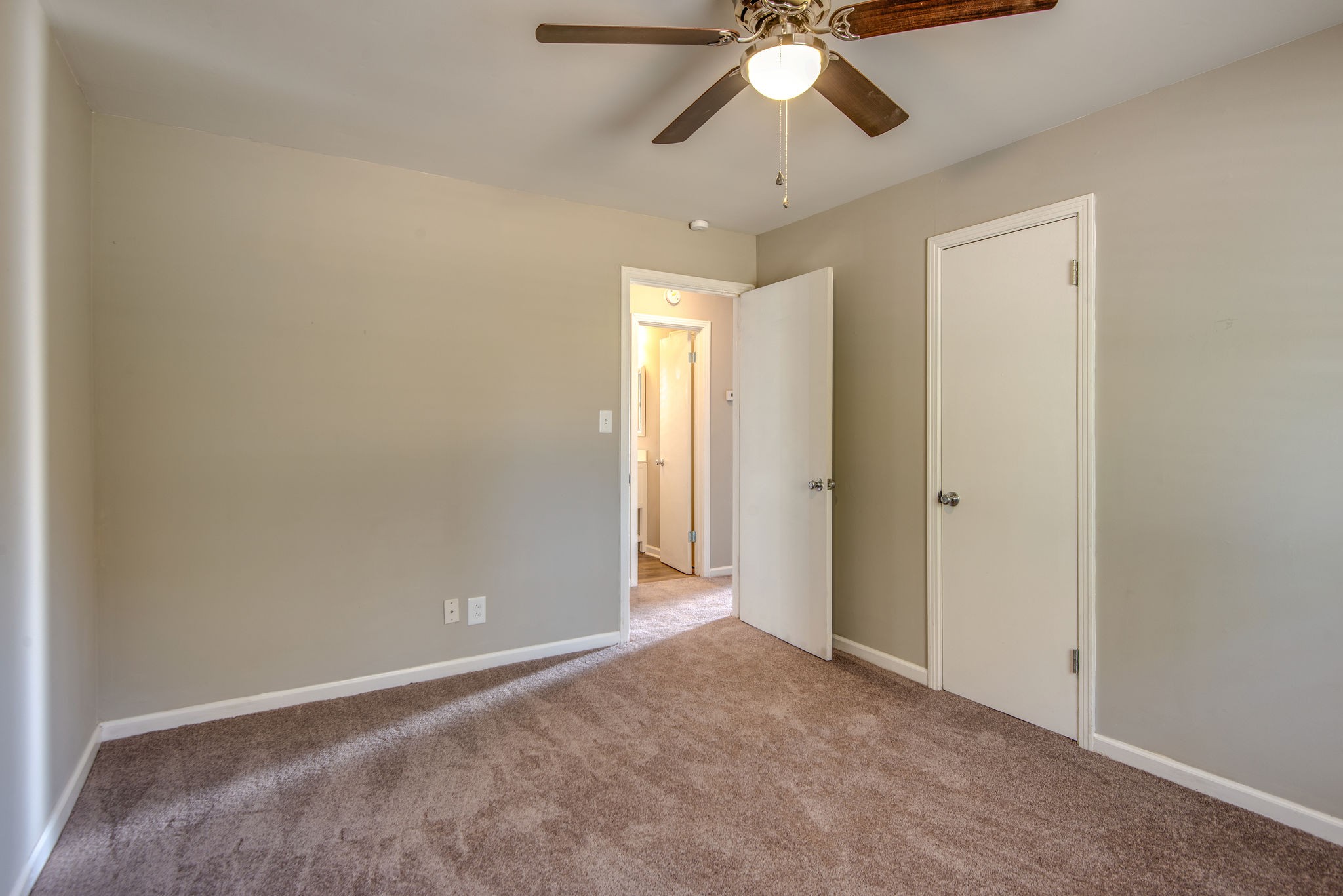 2154 Lake Road Greenbrier, TN 37073 - Photo 14 of 24 an empty room with closet and a chandelier fan