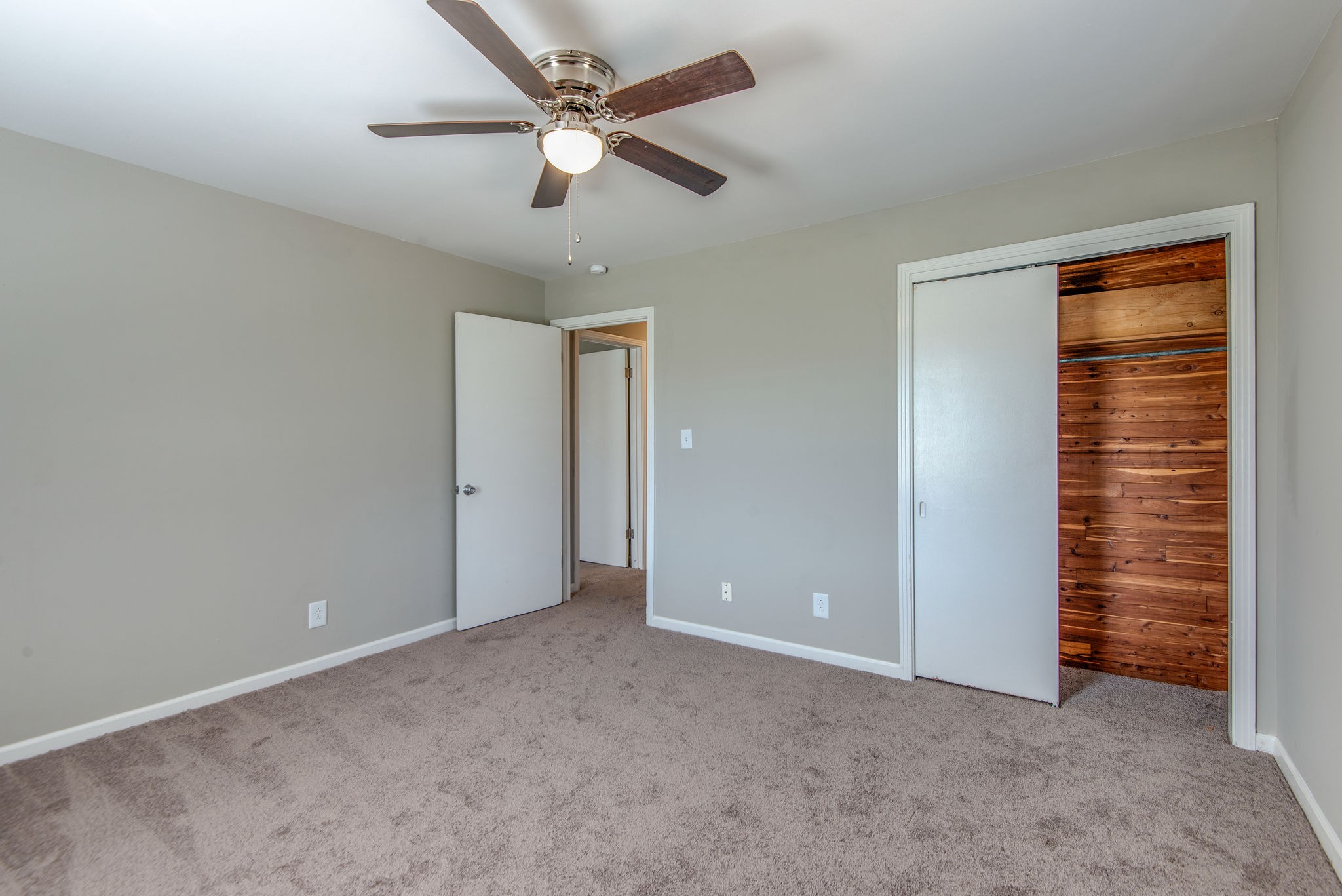 2154 Lake Road Greenbrier, TN 37073 - Photo 15 of 24 an empty room with closet and fan