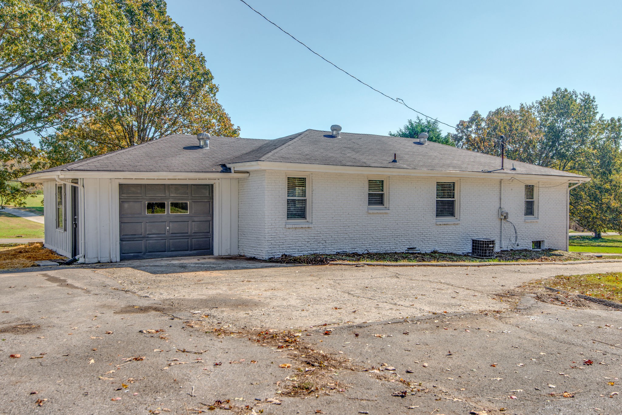 2154 Lake Road Greenbrier, TN 37073 - Photo 19 of 24 a front view of a house with a garden