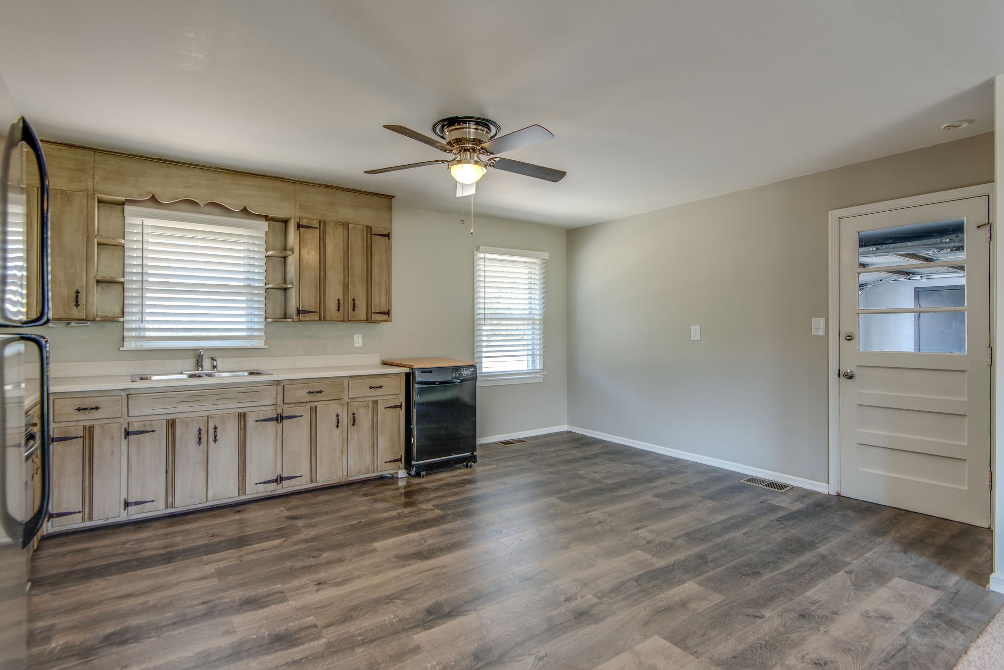 2154 Lake Road Greenbrier, TN 37073 - Photo 5 of 24 a view of a kitchen cabinets a sink and wooden floor