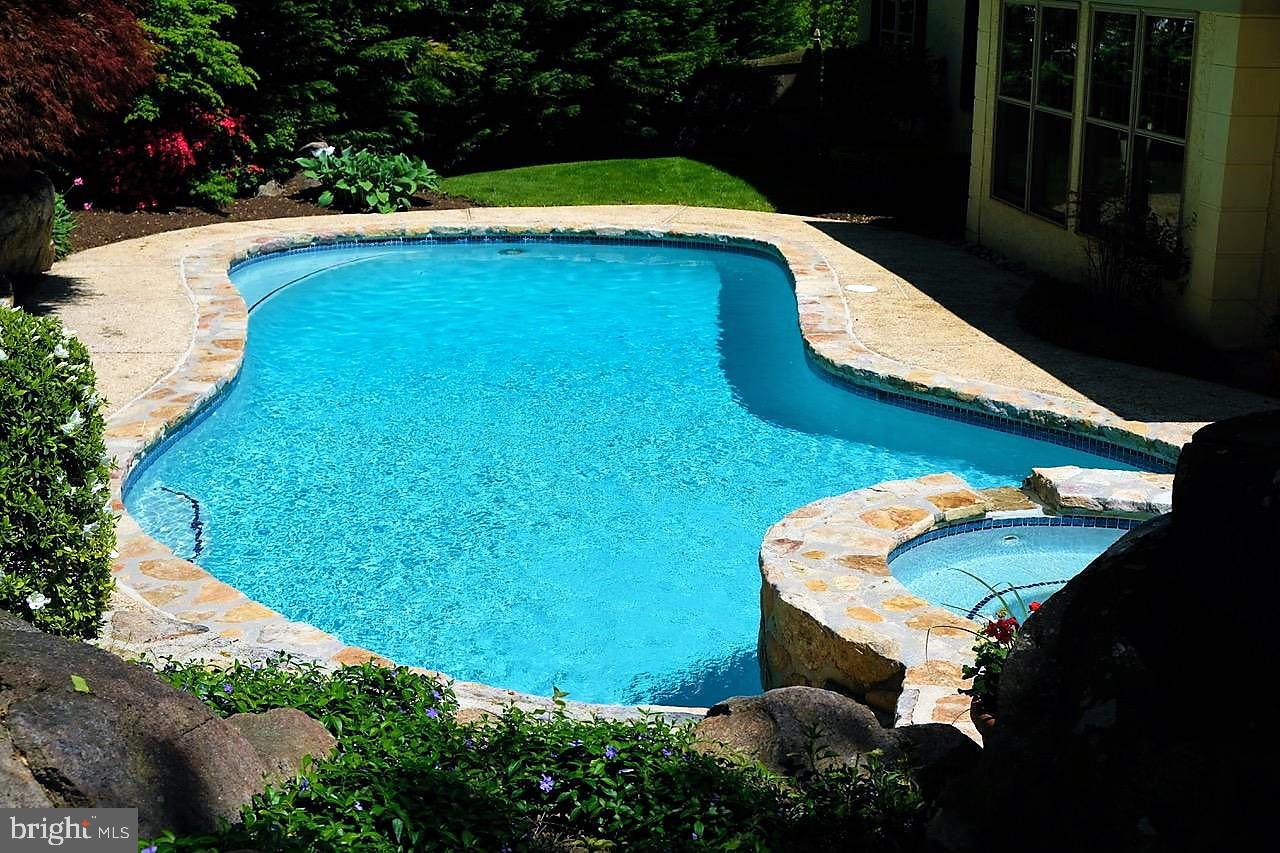 1066 Beaumont Road Berwyn, PA 19312 - Photo 38 of 40 Architect designed pool with spa and waterfall