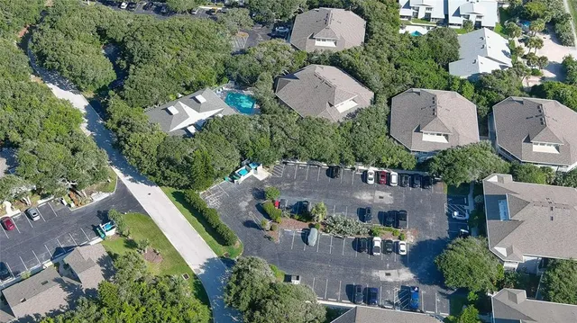 an aerial view of house with yard