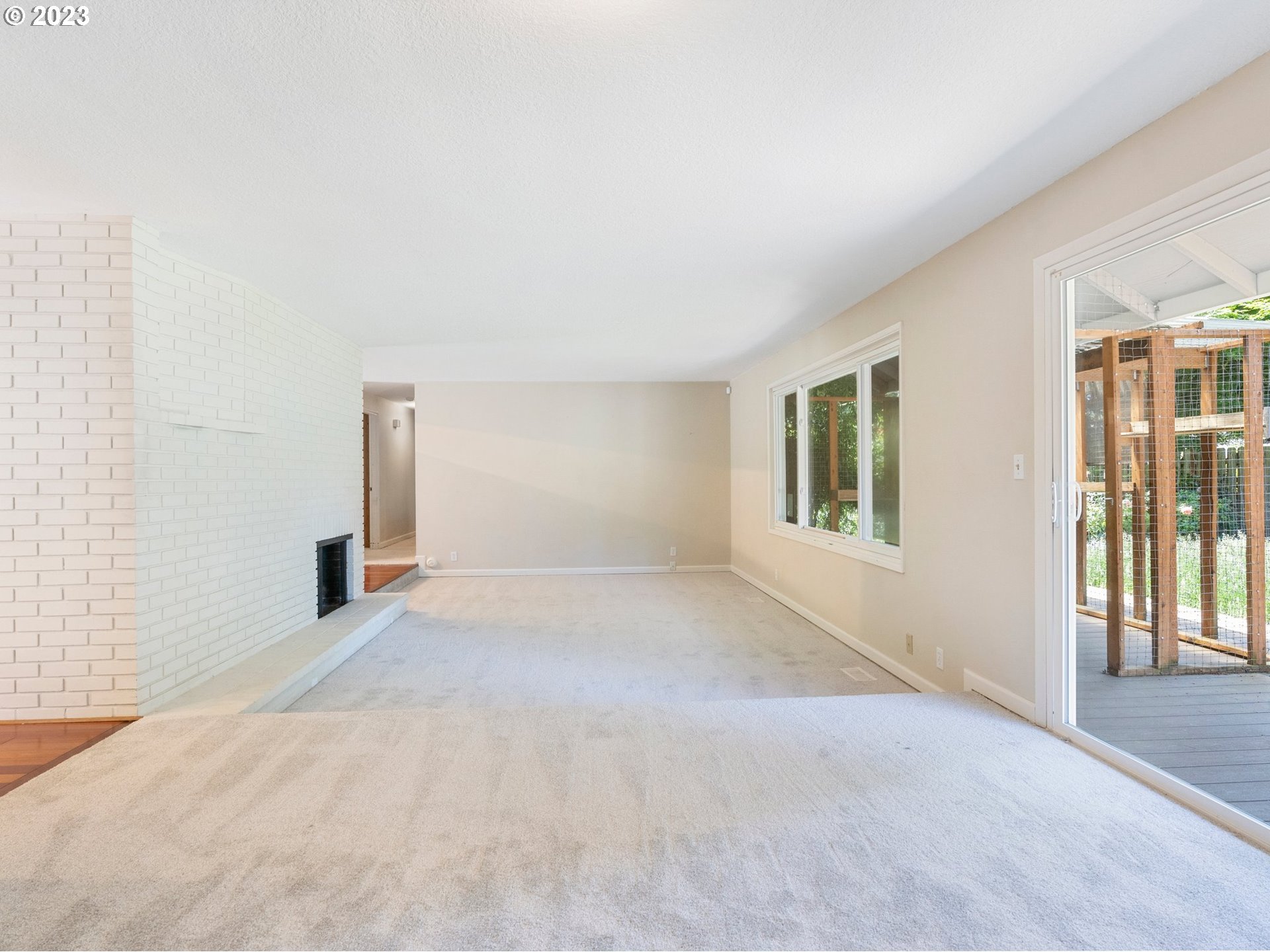 17875 Southwest Shawnee Trail Tualatin, OR 97062 - Photo 11 of 44 a view of empty room with floor to ceiling window