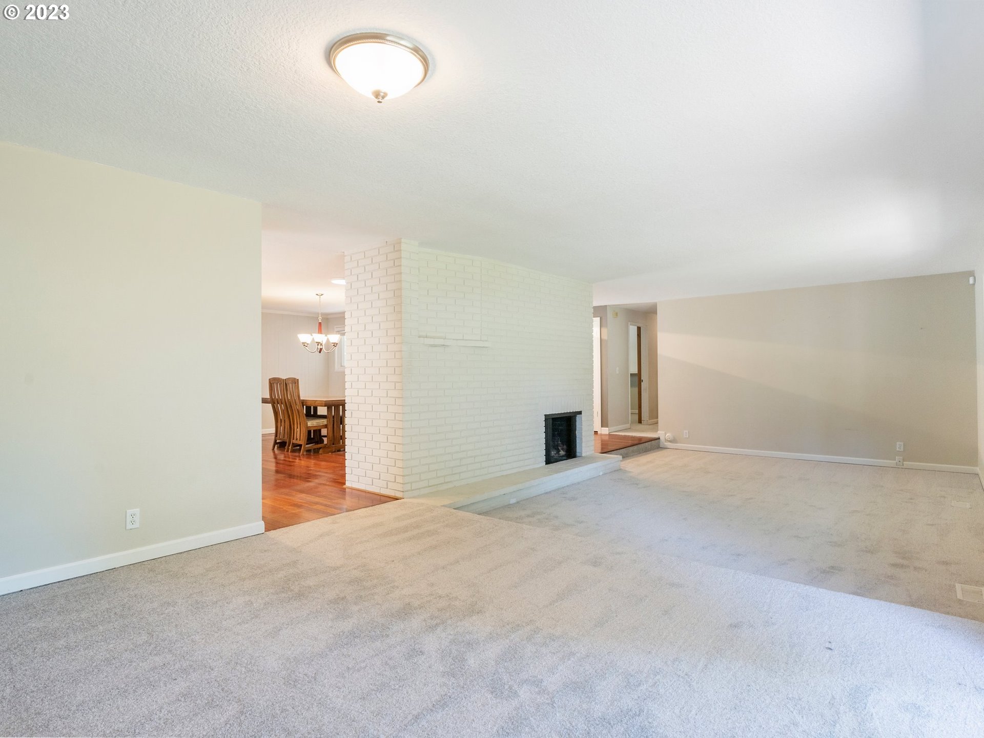 17875 Southwest Shawnee Trail Tualatin, OR 97062 - Photo 12 of 44 an empty room with kitchen view