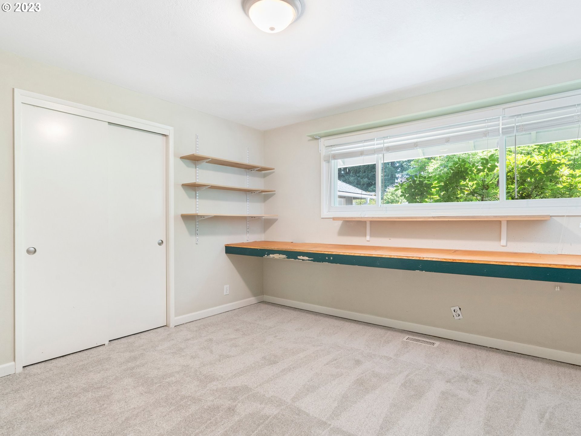 17875 Southwest Shawnee Trail Tualatin, OR 97062 - Photo 17 of 44 a view of an empty room with a window
