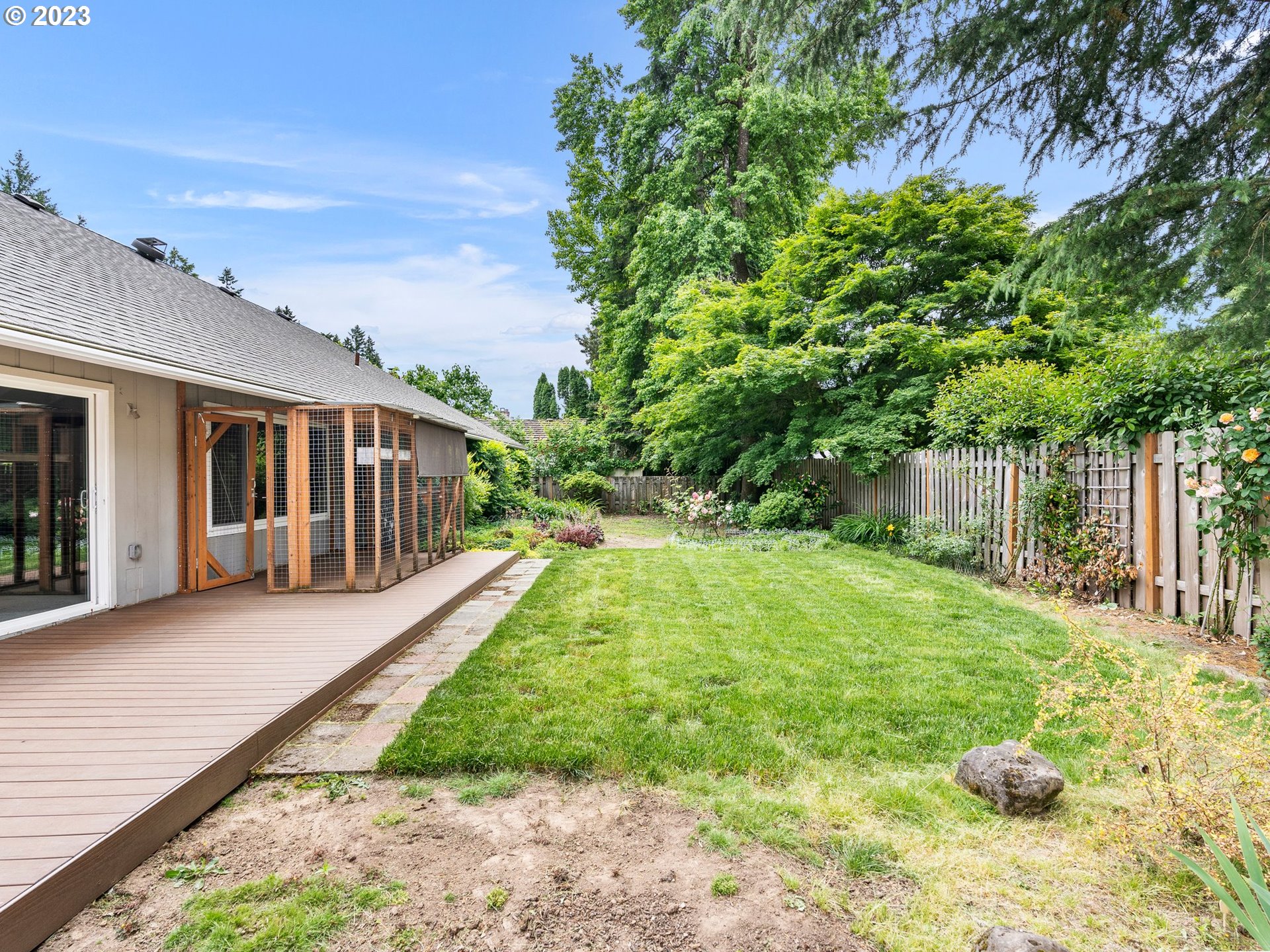 17875 Southwest Shawnee Trail Tualatin, OR 97062 - Photo 30 of 44 a view of a house with backyard and sitting area