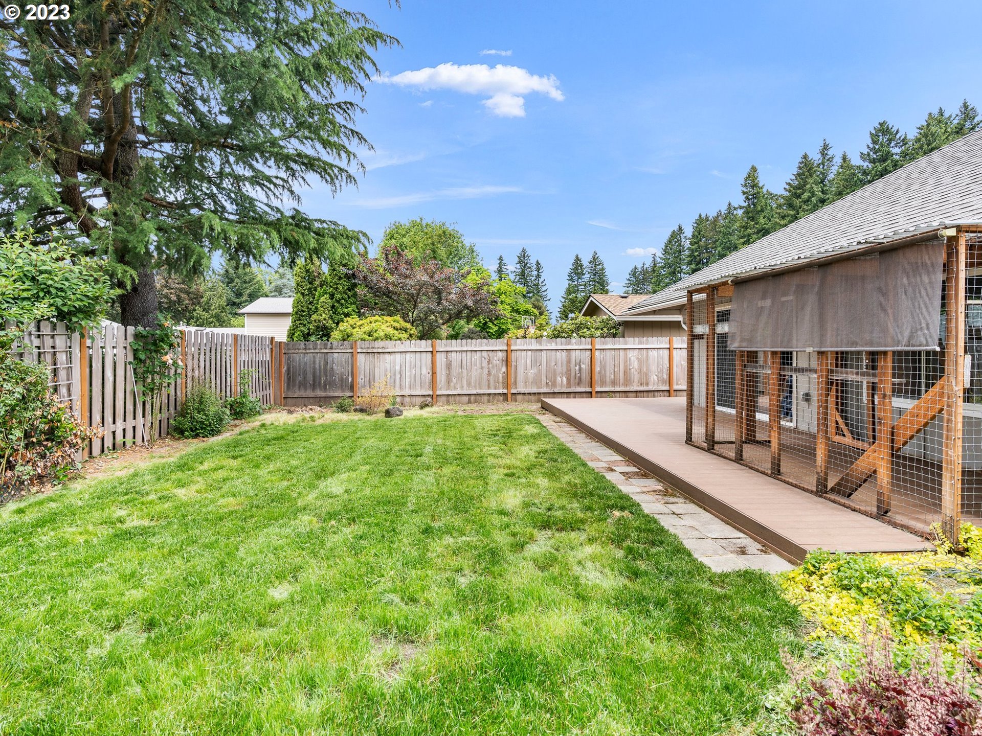 17875 Southwest Shawnee Trail Tualatin, OR 97062 - Photo 33 of 44 a view of a backyard with a garden