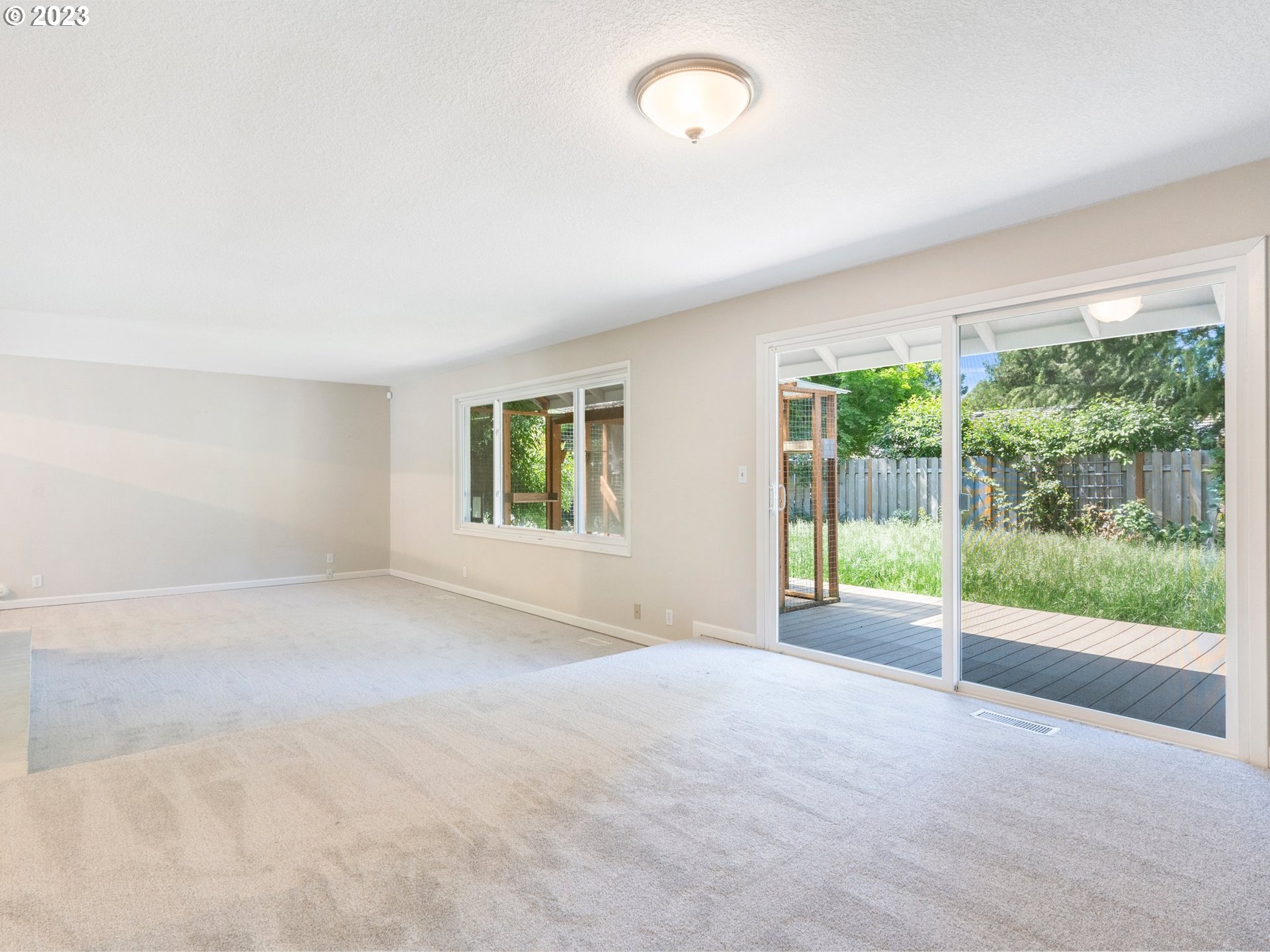 17875 Southwest Shawnee Trail Tualatin, OR 97062 - Photo 10 of 44 a view of a big room with a large windows
