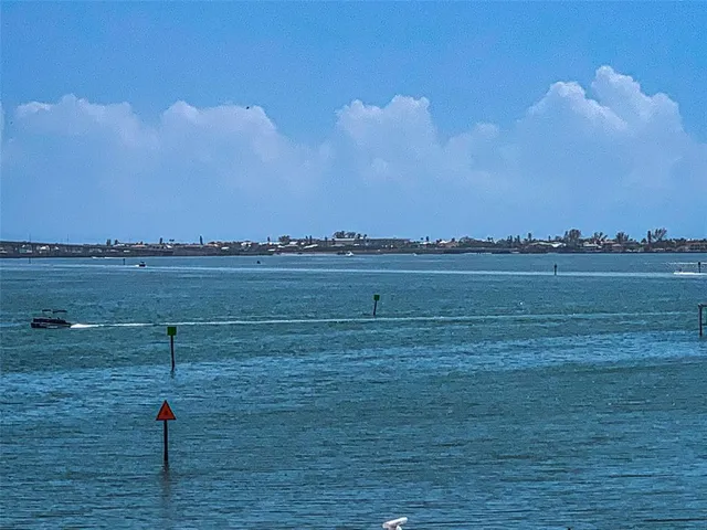 a large kitchen with stainless steel appliances double vanity and a granite counter tops