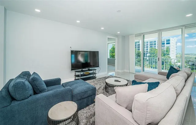 a kitchen with granite countertop dining room cabinets and stainless steel appliances
