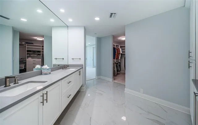 a view of a swimming pool with a lounge chairs