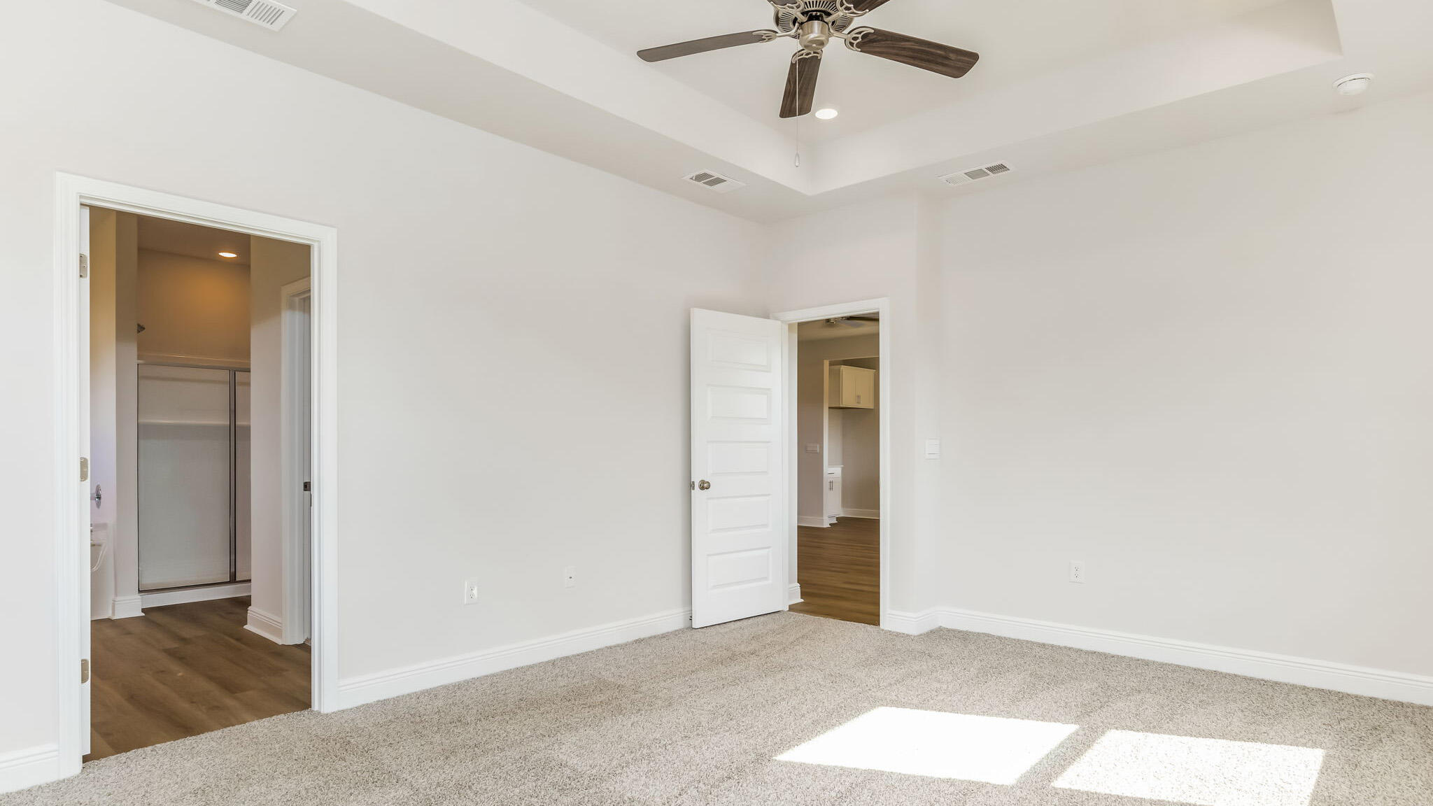 5619 Thatcher Road Crestview, FL 32539 - Photo 14 of 32 an empty room with a ceiling fan and a window
